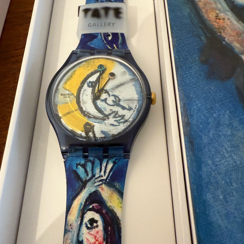 Chagall’s blue circus Swatch watch - Artistic Blue and Yellow Watch